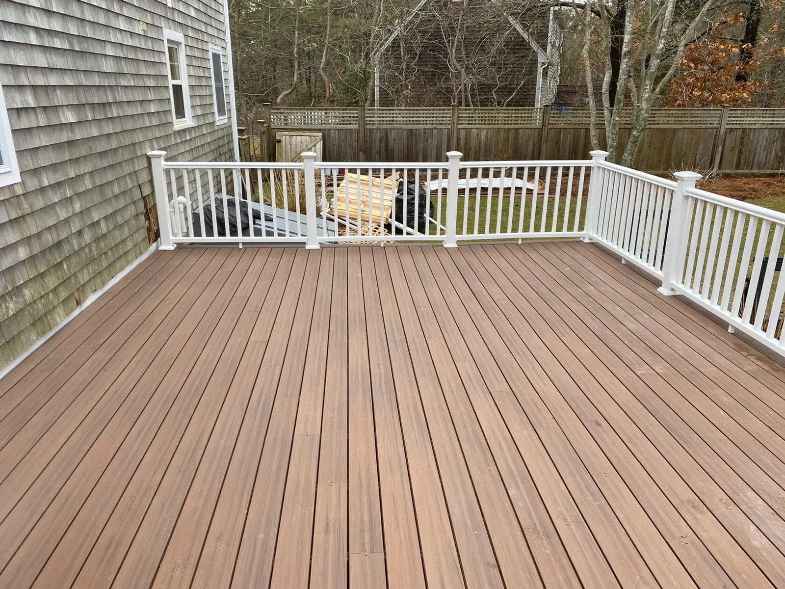 Custom Trex composite deck building project in Cape Cod MA by JPA Construction